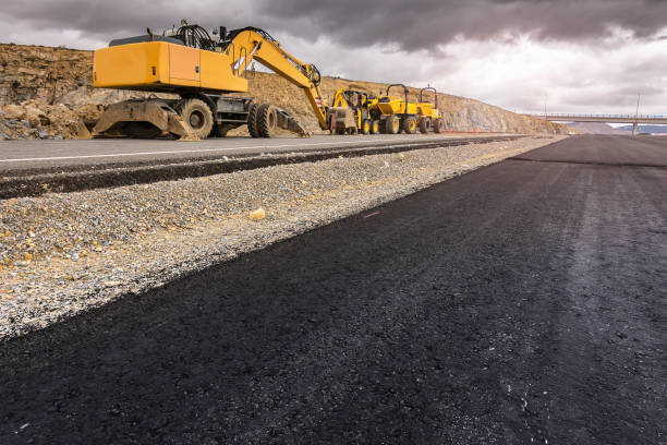 Construction of road with heavy machinery Construction of road with heavy machinery